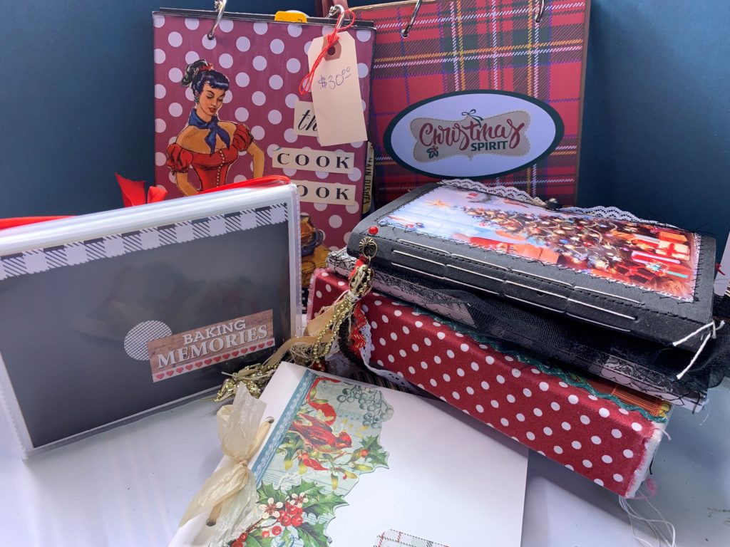 a selection of Christmas scrapbooks and journals
